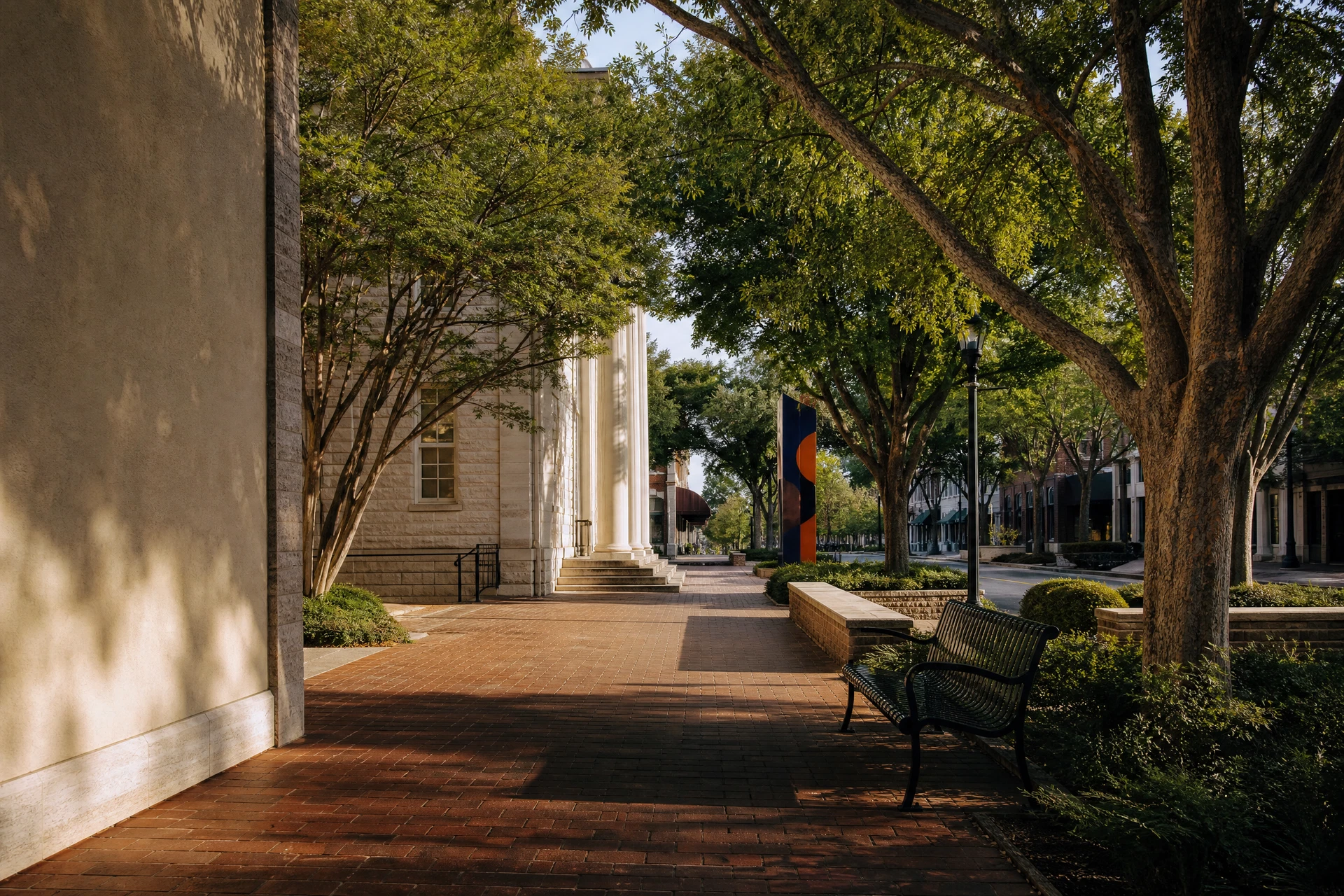 Representative Fayetteville civic-scale brick public realm and shaded downtown character